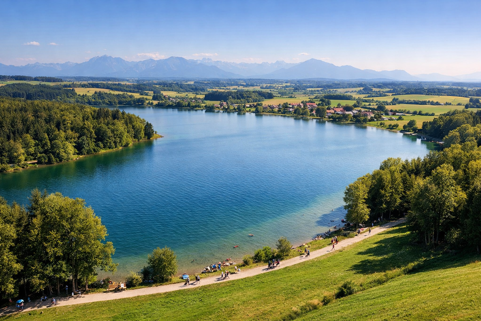 Aerial () editorial image showing a panoramic bird's-eye view of the Abtsdorfer See lake surrounded by Bavarian countryside